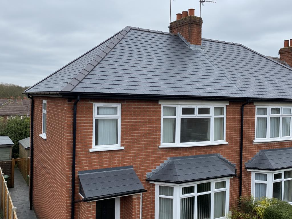 British home with a natural slate roof